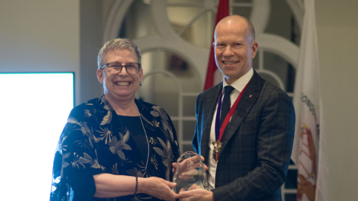 Ellen Lipman receiving the James H. Graham Award of Merit.